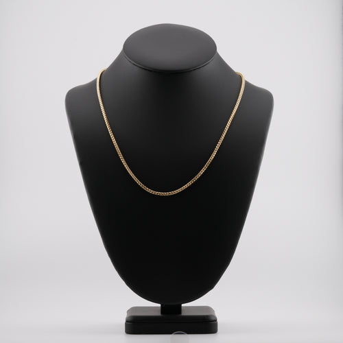 2.5mm diamond-cut franco solid gold chain on a neck display