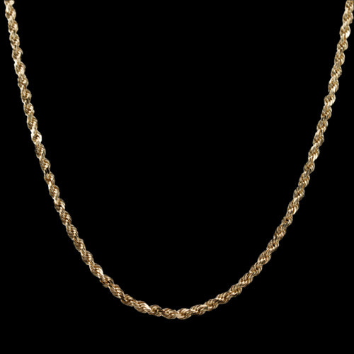 2.5mm diamond-cut rope solid gold chain on a black background