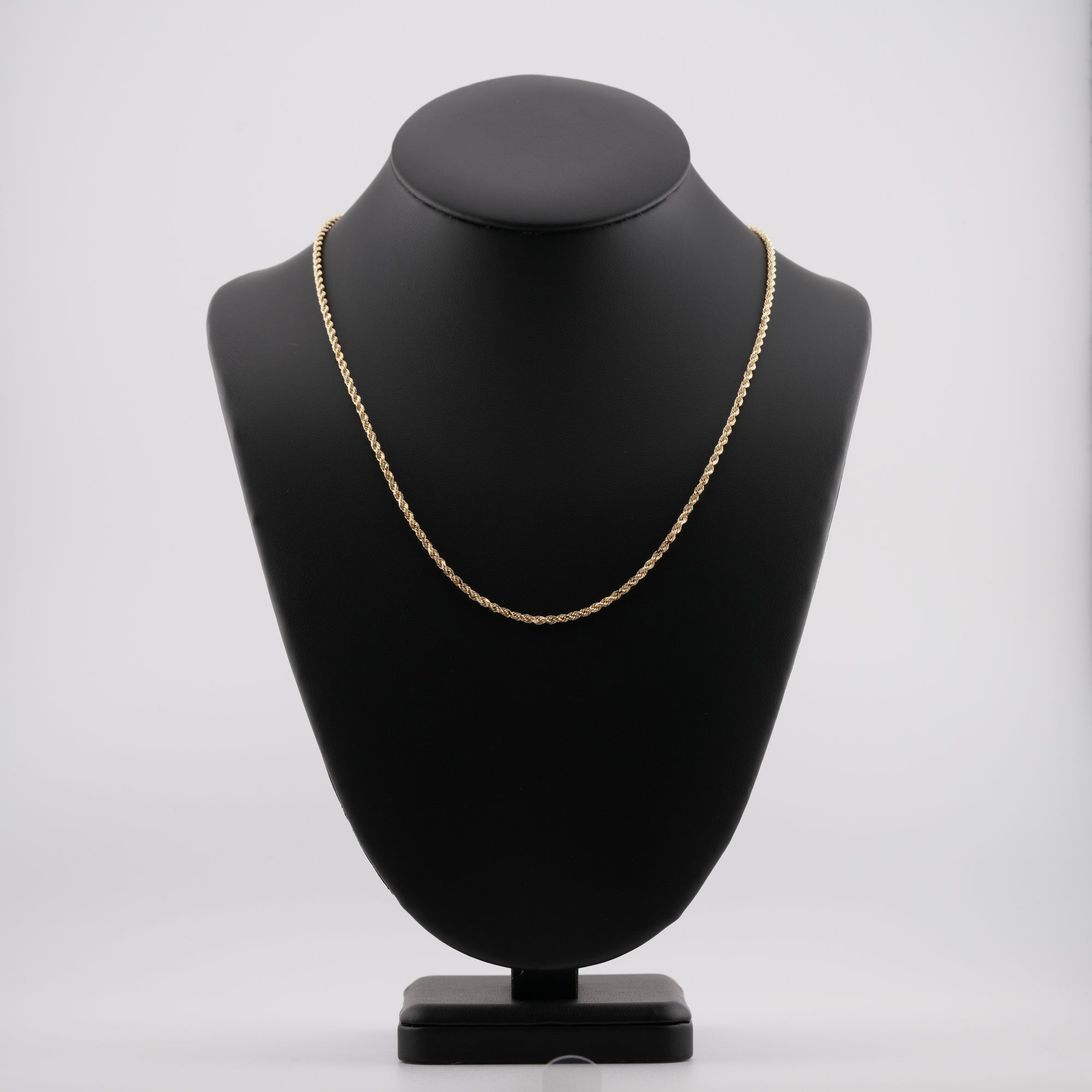 2.5mm diamond-cut rope solid gold chain on a neck display