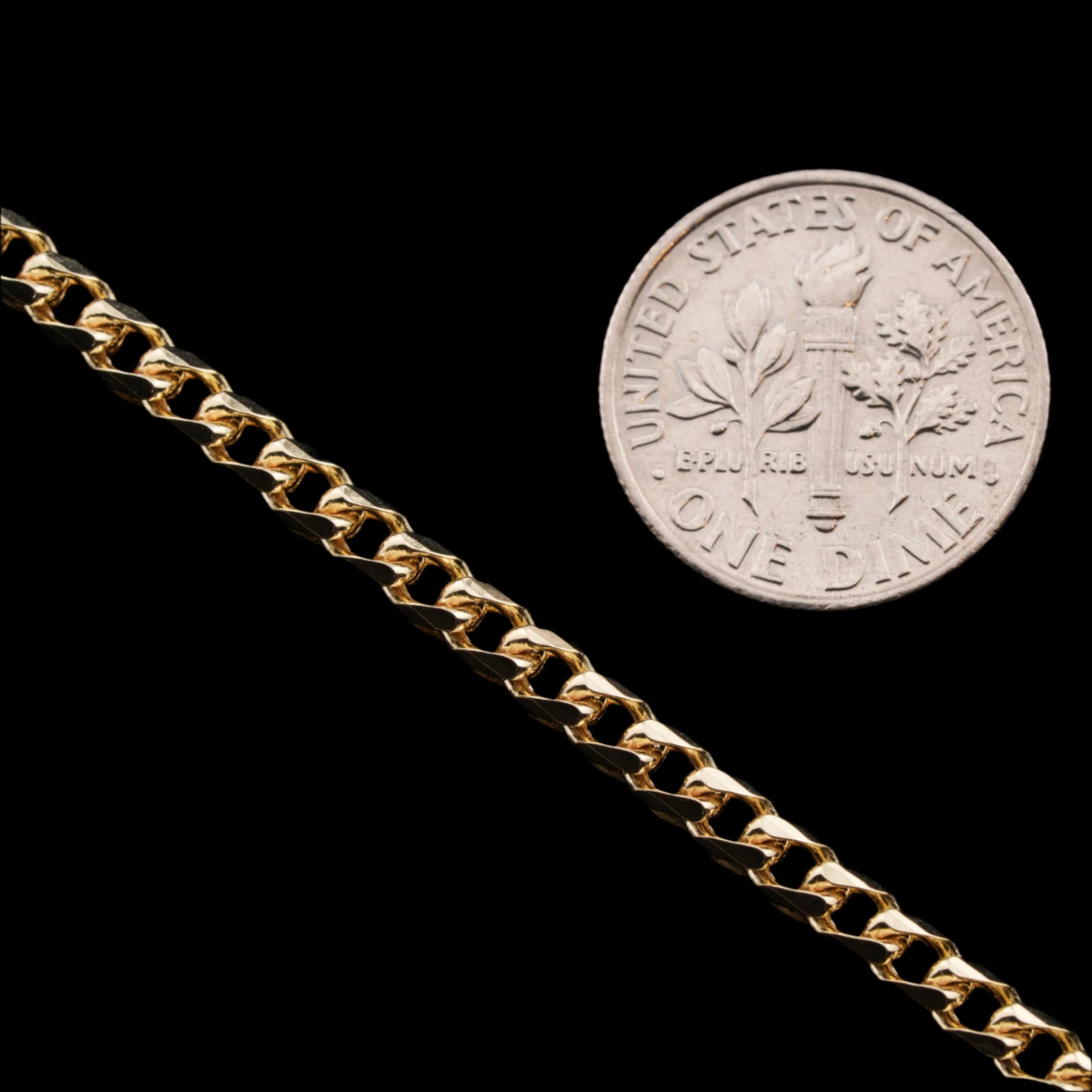 3mm diamond-cut franco solid gold chain next to a dime for size comparison