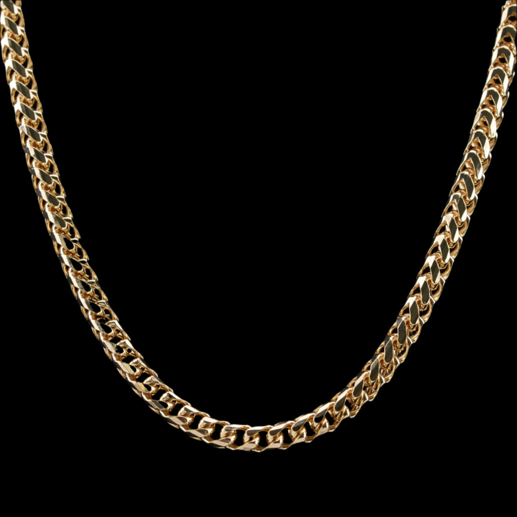 4mm diamond-cut franco solid gold chain on a black background