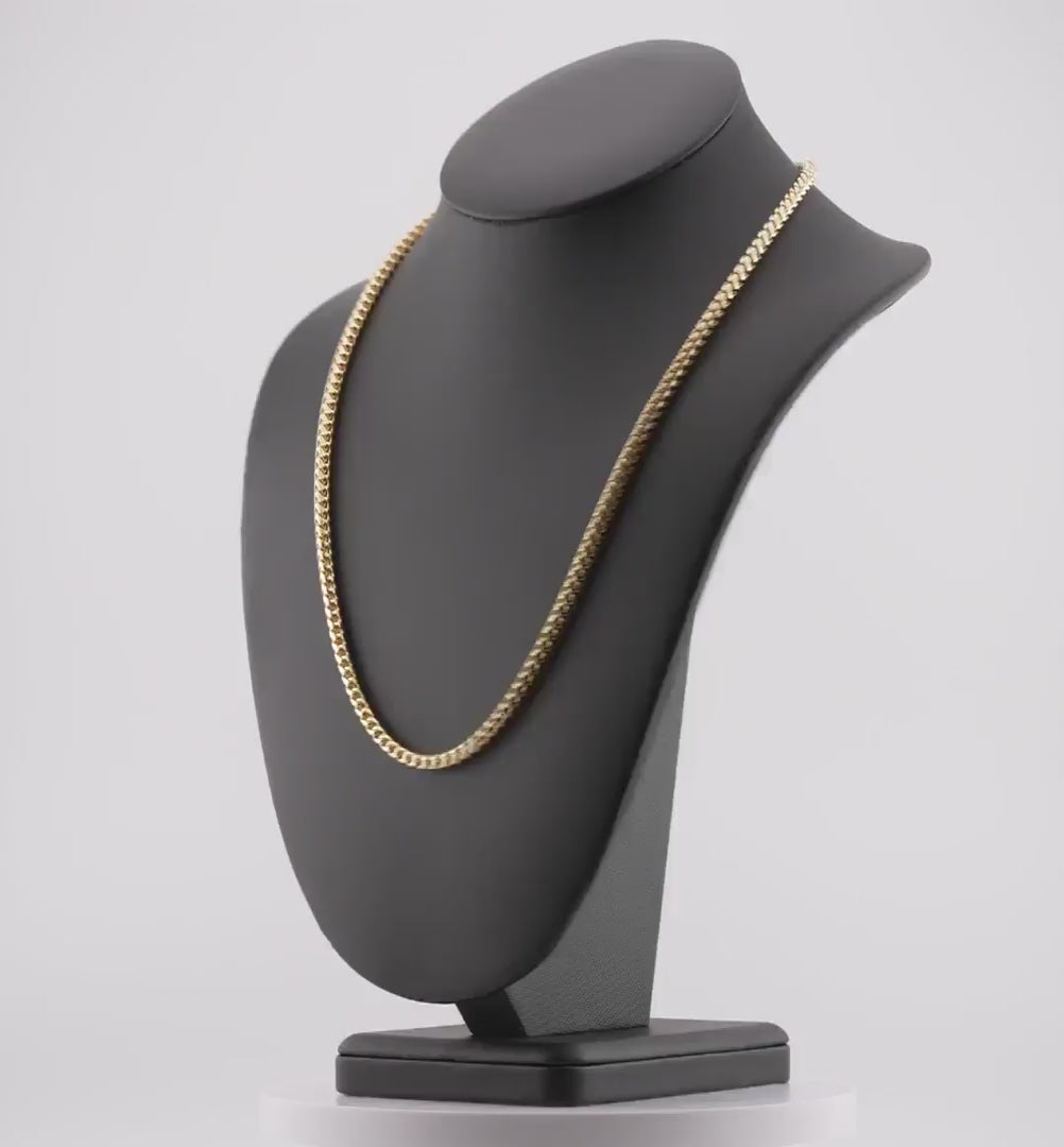 Video of a 4mm diamond-cut franco solid gold chain spinning on a neck display