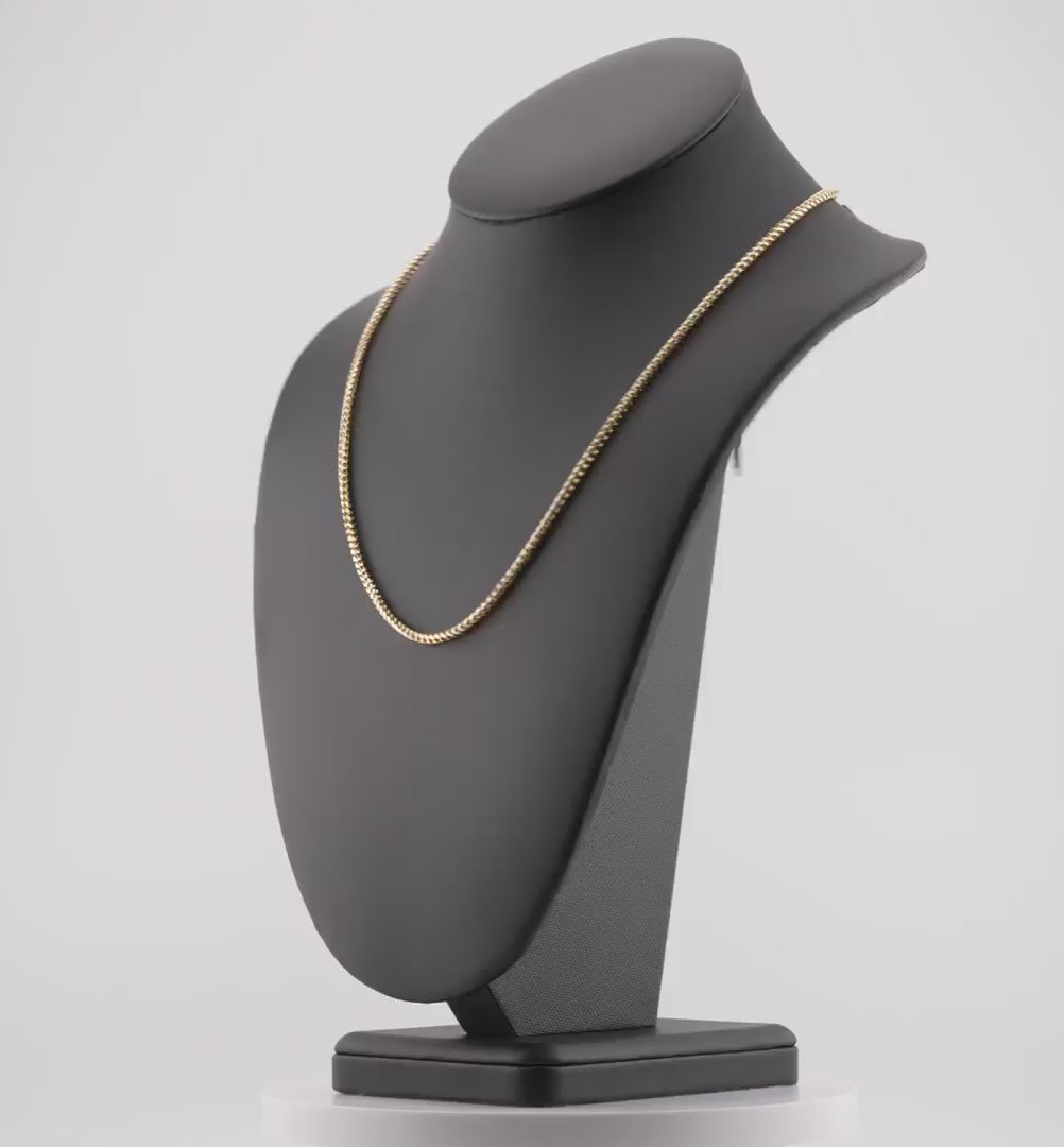Video of a 2.5mm diamond-cut franco solid gold chain spinning on a neck display